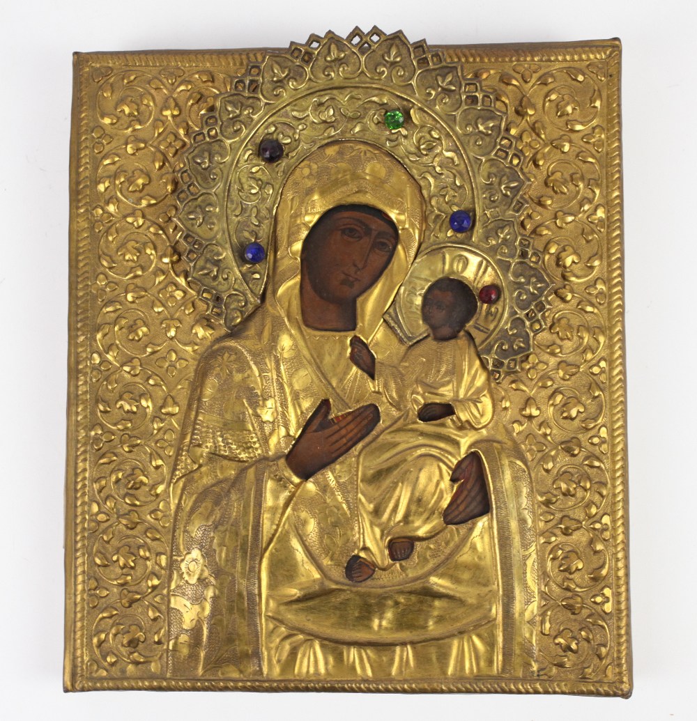 Russian icon of the Mother of God of Iberia with repoussé gilt metal riza and haloes with paste