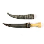 An Ottoman, or other Asian, Jambiya with marine ivory handle and curved blade; the white metal