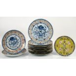 Eleven modern Chinese dishes, 24 cm diameter; together with a famille rose plate marked with Jiangxi