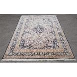 AMENDED DESCRIPTION AND ESTIMATE Large Persian part silk rug, having central floral medallion and