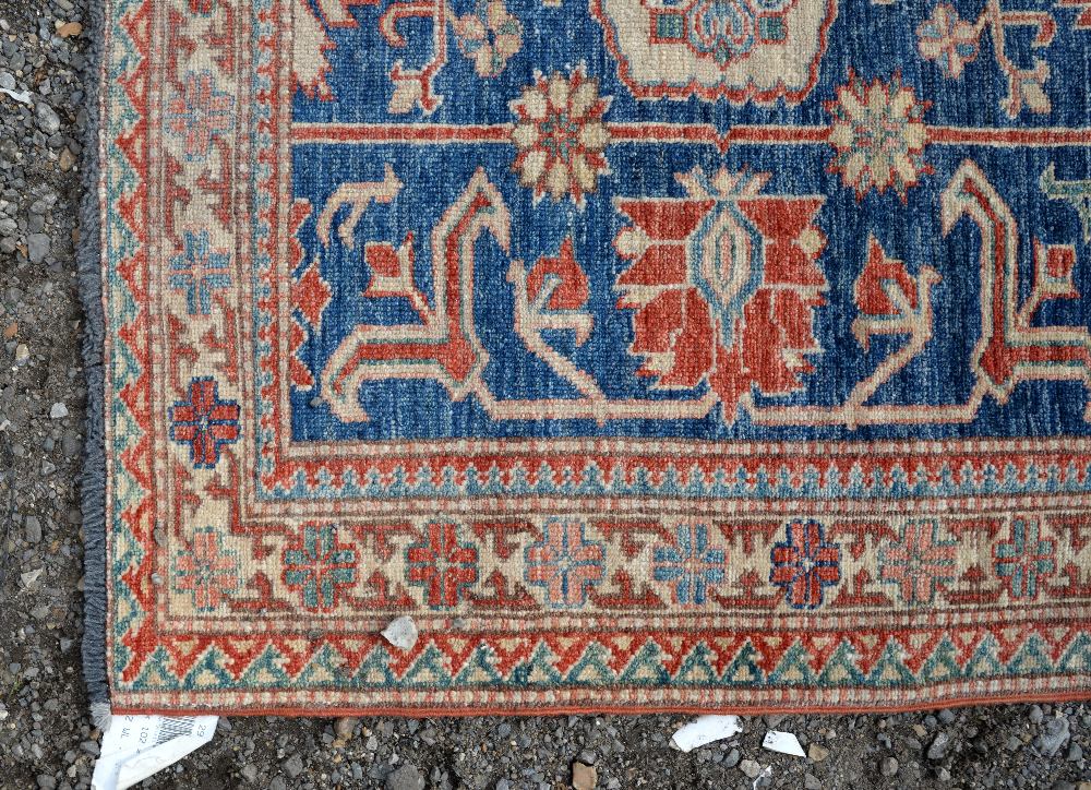 Kazak style rug, stylised floral motifs within floral panels, 144 x 103cm - Image 3 of 4