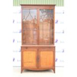 19th century glazed bookcase cabinet with two glazed doors above a pull out reading stand and two