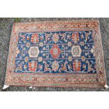 Kazak style rug, stylised floral motifs within floral panels, 144 x 103cm