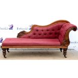 19th century mahogany button back chaise lounge with carved show frame, and turned feet on