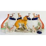 Collection of over 20 Staffordshire dogs and sheep, mainly greyhounds, tallest 27cm high