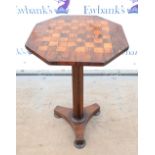 Early 19th Century rosewood octagonal games table with chequer inlay of satinwood, column supports