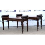 Pair of Regency mahogany hall benches, with scroll bolster ends on reeded legs, H53 x W93 x D35cm