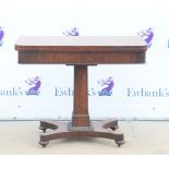 19th century rosewood card table, on column support and quatrefoil base with bun feet and castors,