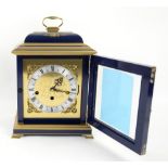 Comitti early Georgian style basket top mantel clock with triple chime movement, blue lacquered