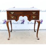 Early 19th century walnut lowboy with crossbanded inlaid decoration, with three drawers on