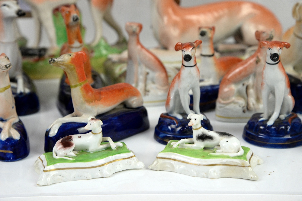 Collection of over 20 Staffordshire dogs and sheep, mainly greyhounds, tallest 27cm high - Image 14 of 15