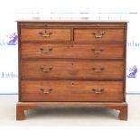 19th century mahogany chest of two short over three long graduated drawers below a brushing slide on
