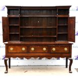 19th century oak and mahogany crossbanded dresser, plate rack with two cupboard doors above three