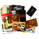 Aston Martin DB Instruction Book together with old car brochures, including Morris Minor, Mini, MG,