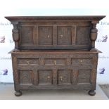 18th century and later floral carved oak buffet, with carved cornice and twin baluster turned