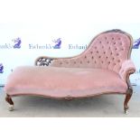 Late 19th Century walnut button back chaise lounge upholstered in pink velour fabric with carved