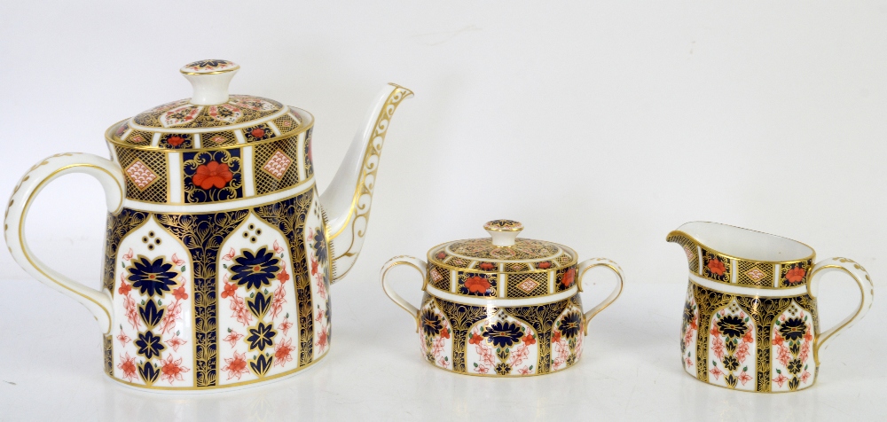 Royal Crown Derby Imari pattern no 1128 teapot, h19cm, twin handled sugar bowl and cover, and