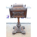 19th Century carved oak teapoy on column support and shaped quatrefoil base and bun feet. H87 W36