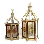 Two gilt metal and glass hall lanterns, one H65 x W34 x 29cm, other H55 x W33 x D29cm