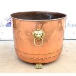 19th century copper coal bucket with lion paw brass feet.H49x W65 xD65.