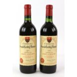 Two bottles of Chateaux Grand Corbin Manuel, Saint Emilion Grand Cru red wine, 1975 vintage (2)