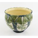 Burmantofts jardinière, with large scale incised clover leaf decoration, on a cream and blue ground,