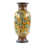 Aesthetic movement Doulton faience vase, circa 1880, decorated with blue and green flowers on an