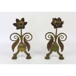 Aesthetic movement pair of brass firedogs in the form of a flower, with copper coloured leaves, on