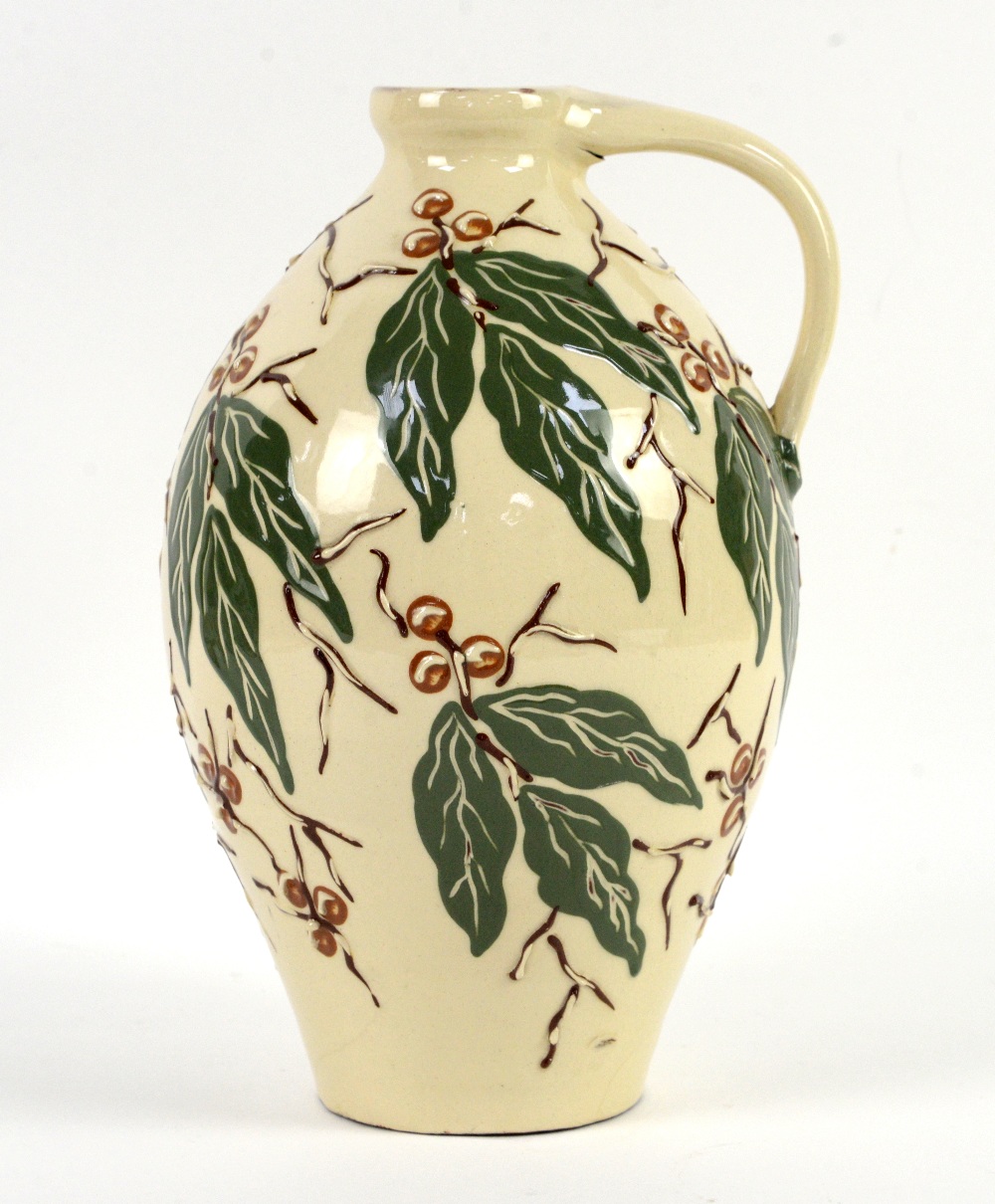 C H Brannam, Barnstaple studio pottery jug with green leaves and brown berries decoration on a cream - Image 5 of 10