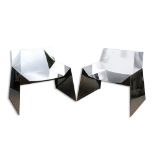Emilio Nanni for Cattelan Italia, pair of Alaska lounge chairs in geometric stainless steel, bearing