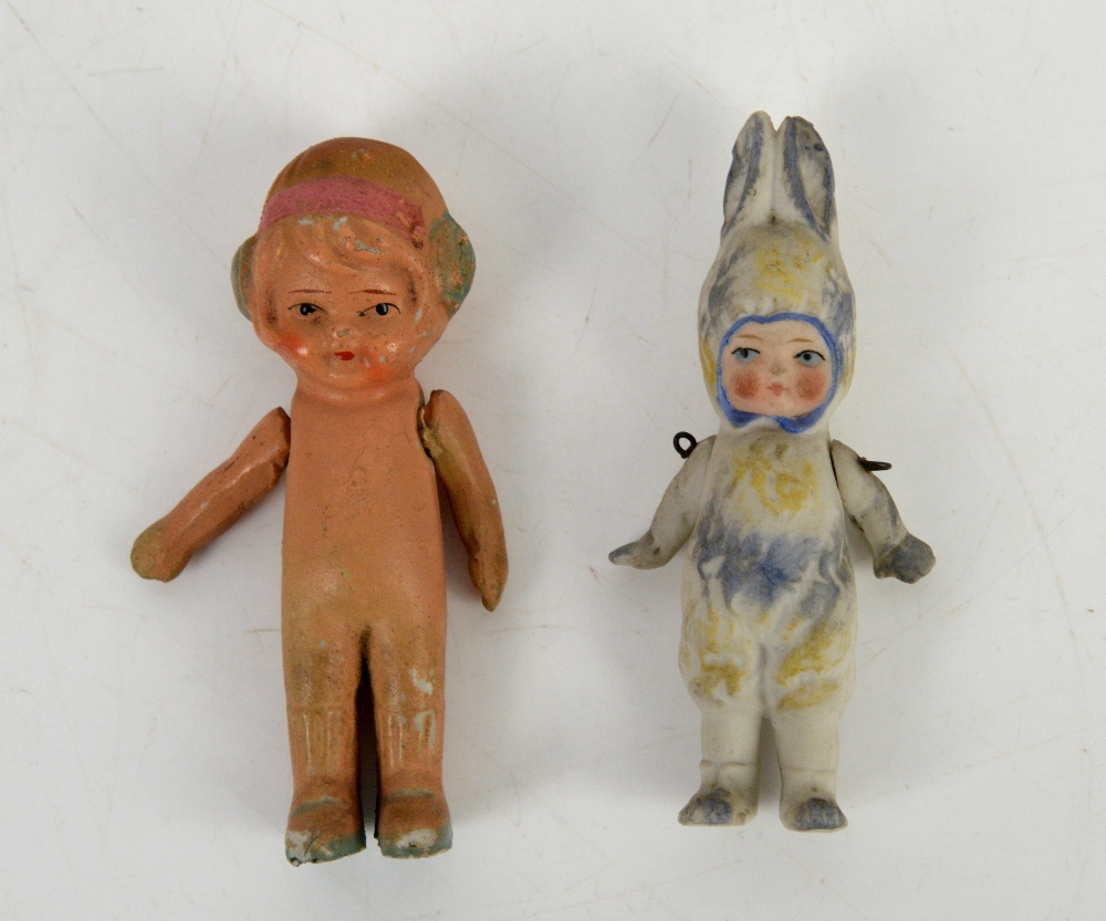 A German bisque miniature doll in rabbit costume, German, circa 1910, Miniature flapper girl ceramic