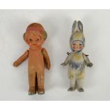 A German bisque miniature doll in rabbit costume, German, circa 1910, Miniature flapper girl ceramic