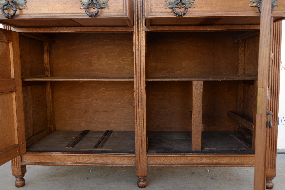 Arts and Crafts / Art Nouveau oak dresser with mirrored back on bun feet, w146 x d54, height base - Image 11 of 36