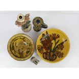 Mary Wondrausch slip decorated pottery; two bowls decorated with flowers, one monogrammed MW to