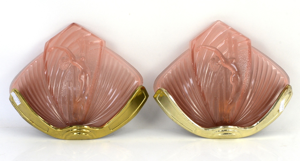 Art Deco style pair of pink glass fan shaped wall lights moulded with female nude with arms