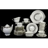 Royal Doulton Art Deco part tea service, with silver bands on a white ground, angular handles,