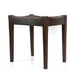 Arts & Crafts stool in the style of Arthur Simpson of Kendall, with interlaced leather strapwork