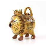 Mary Wondrausch slip decorated pottery lion, 'Silver Jubilee 1952-1977' to one side and 'Elizabeth