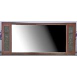 Art Nouveau rectangular mahogany wall mirror, the central bevelled mirror flanked by metalwork