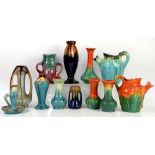 Belgium pottery, including two Wasmuel pitchers, one with burnt orange and yellow drip glaze over