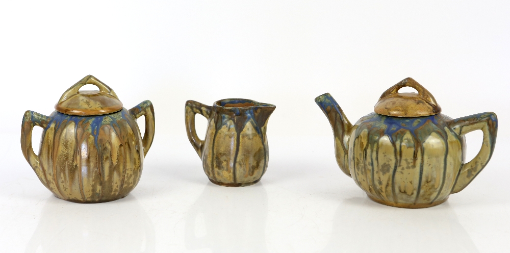 Gilbert Metenier, France, drip glaze teapot, sugar bowl with cover and cream jug, the blue-green