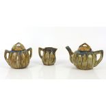 Gilbert Metenier, France, drip glaze teapot, sugar bowl with cover and cream jug, the blue-green