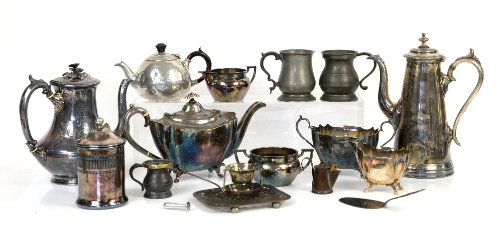 A quantity of silver plate to include various tea and coffee pots, mugs, sugar bowls etc.