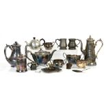 A quantity of silver plate to include various tea and coffee pots, mugs, sugar bowls etc.