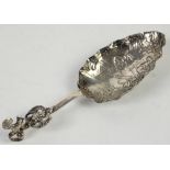 Large highly embossed continental silver wine spoon with cockerel finial, import Chester 1900