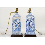 Pair of blue and white ceramic lamps decorated with birds of paradise, with a gilt-metal oil lamp