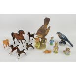 Collection of animals, to include a Royal Copenhagen bird, Beswick horses and Beatrix Potter figures