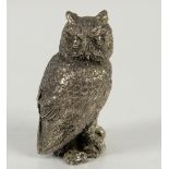 Silver model of an owl sat on a branch, import marks to base