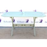Painted garden table together with six painted folding chairs. 150W x 72H x 85D