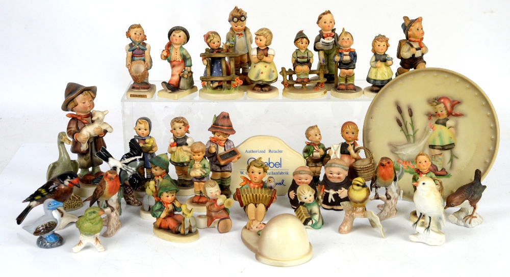 Collection of Goebel Hummel figurines of children (25) and 9 birds